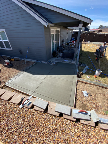 Broom finish concrete hot tub pad
