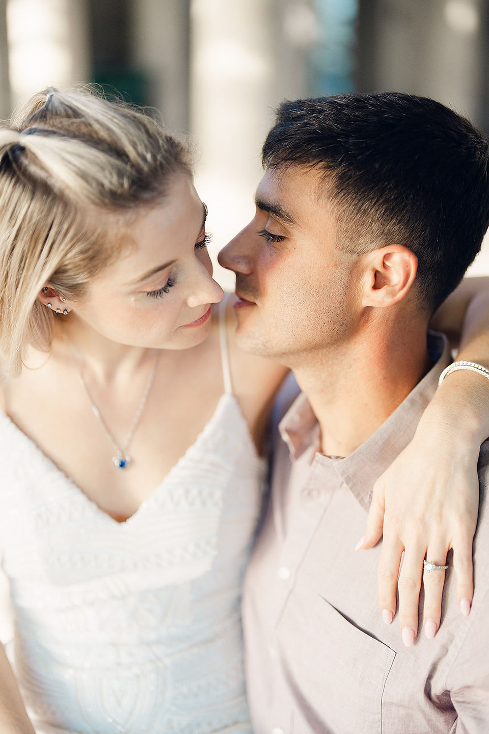 Bekah and Adam go in for a kiss but the camera catches them before impact during their Eolia Mansion at Harkness Park engagement session
