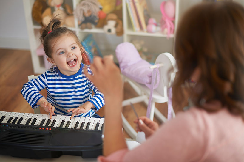 mother-daughter-playing-music-singing.jpg