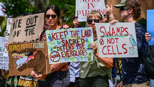 Trump Visits Controversial Florida Migrant Detention Center Dubbed ‘Alligator Alcatraz’