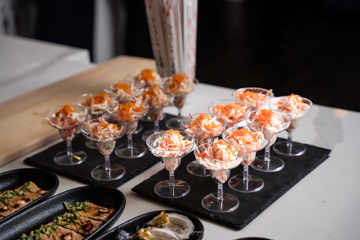 “Elegant appetizer display with assorted gourmet bites.”