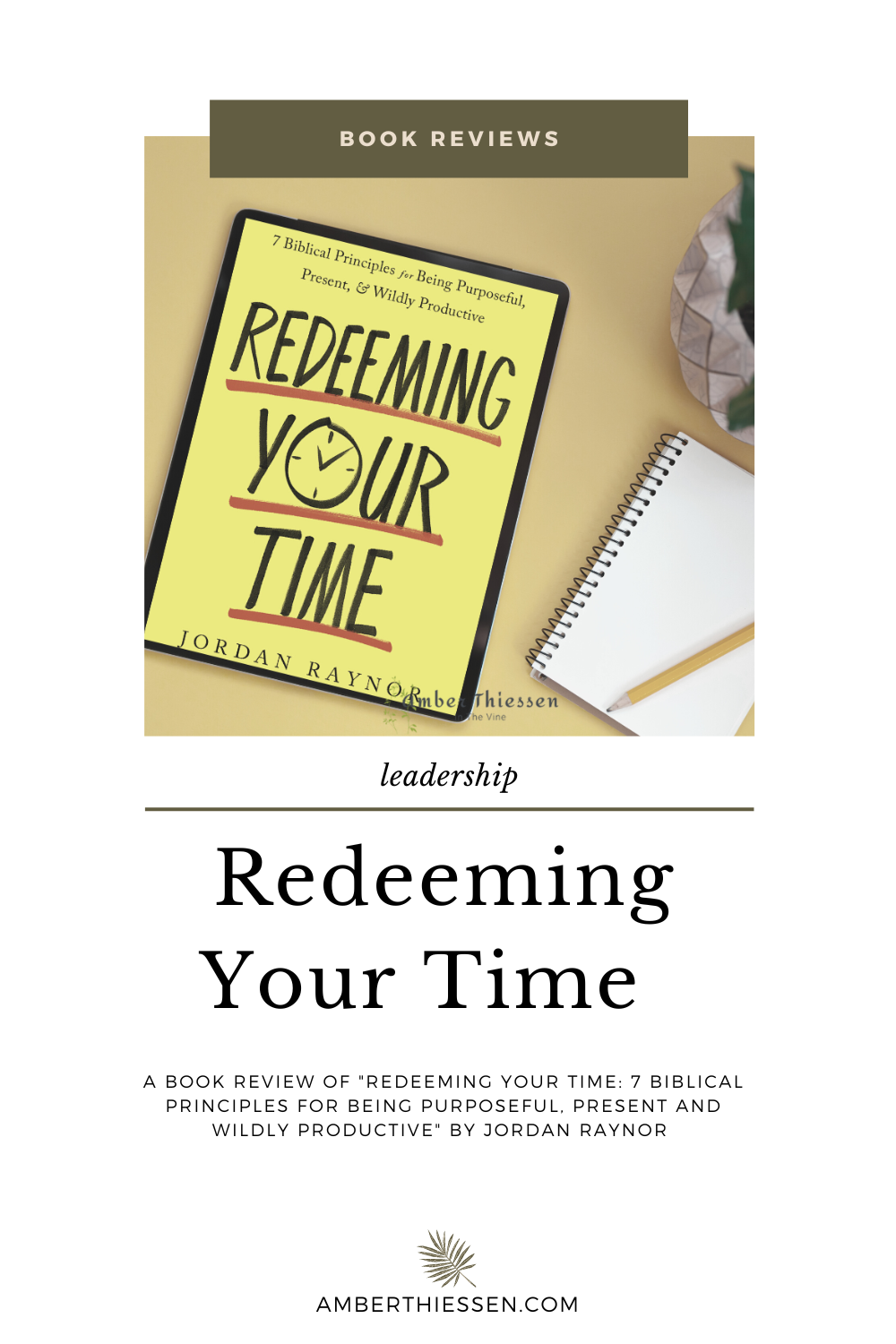 book cover redeeming your time by jordan raynor on yellow desk with notepad