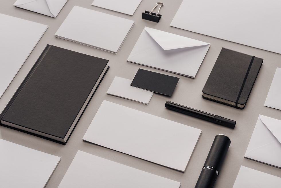 flat-lay-with-white-empty-papers-and-black-office-2024-11-09-19-00-35-utc.jpg