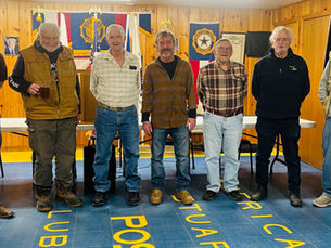 Group of men standing together for recognition at American Legion Post 65 Lubec Maine