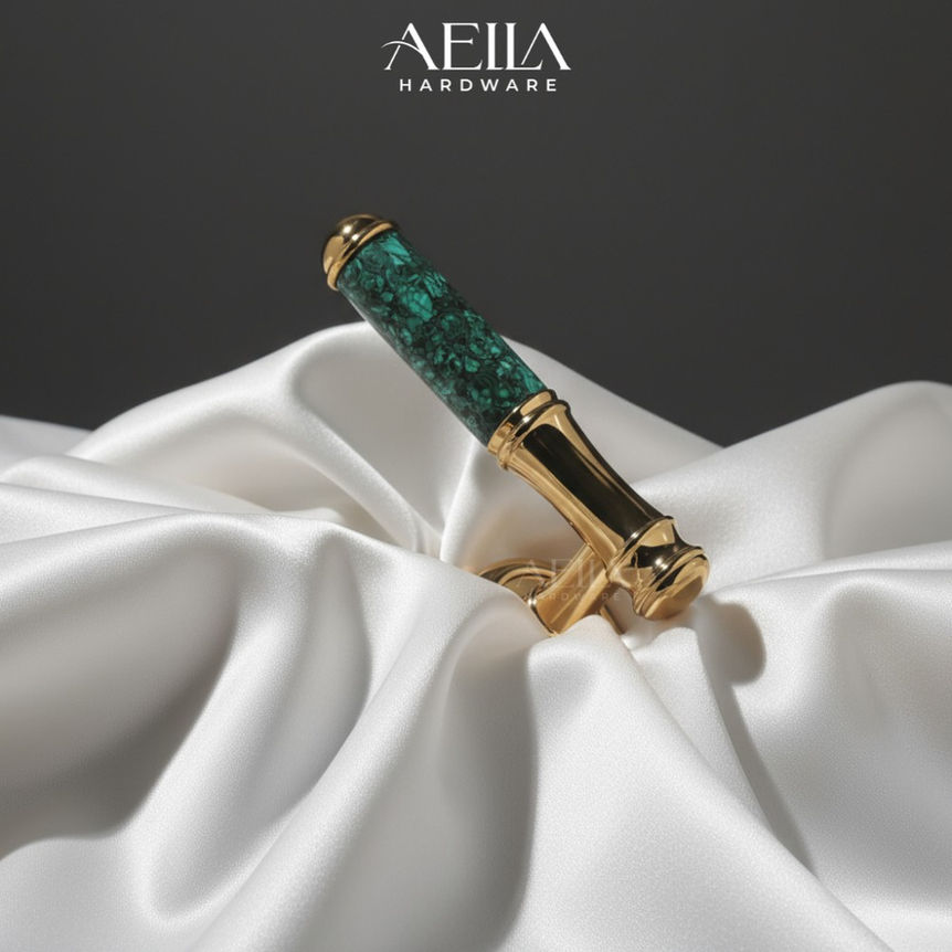AELLA HARDWARE, มือจับก้านโยกรุ่นพิเศษ  - A824-020B, gold knob with green stone on white silk background.