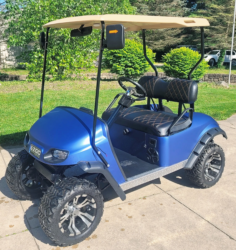 Blue golf cart parked on pavement, Lifted Street Legal Two Seater, sunny day.