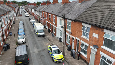 Warrants executed following report of human remains being buried