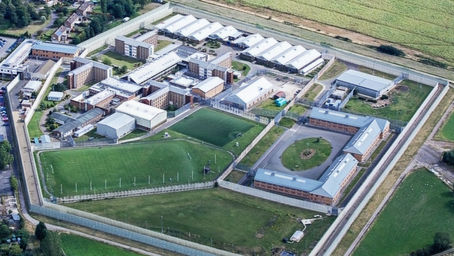 Twenty one people charged over prison smuggling operation
