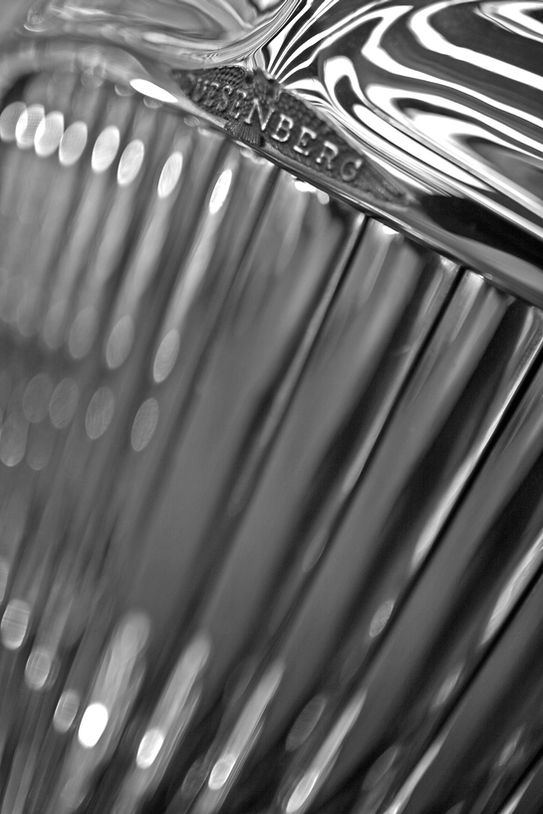 Close-up of a vintage Duesenberg car radiator grille - automotive photography by Gina Taro