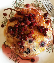pancakes topped with fresh raspberries