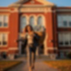 A professionally dressed woman smiling and running away from a public school building carrying an oversized sack of money, used to highlight misconceptions about Texas ESA eligibility; the caption clarifies that while higher-income families are eligible, SB2 prioritizes lower-income and special needs students.