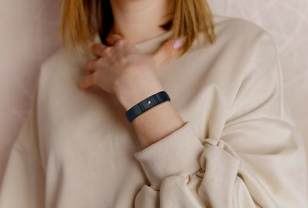 White Woman Happily Wear Sleepday Aura Protection Bracelet