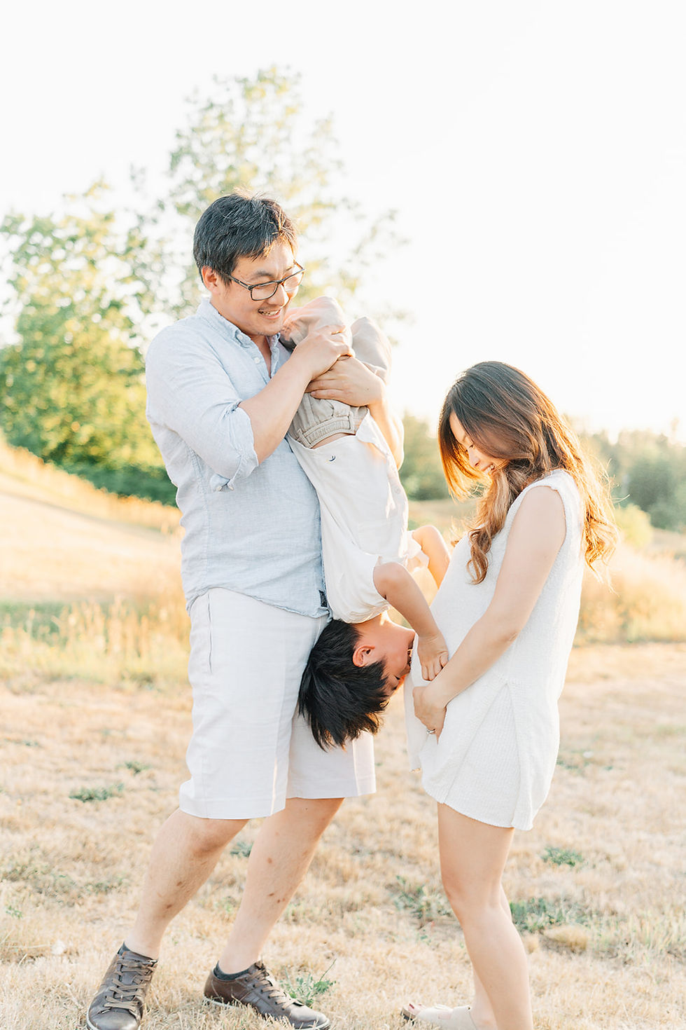 boy kissing mom's belly