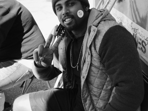 Rapper Louii King at a Music is Medicine Assembly at the Poly Academy of Achievers & Leaders