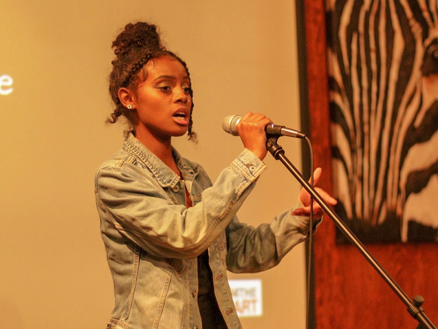 Singer Fana Hues performs at Change the Tune Event