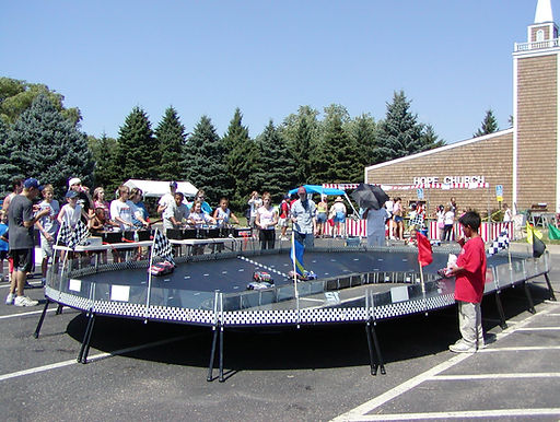 Family and Pet Guide, Family Fun Day event, people racing remote control cars