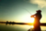 Man fishing at sunset | Catching a fish | Fishing on lake | Fishing on river