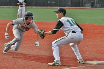 Oliver Pearson safely dives back to first base after a sixth inning single