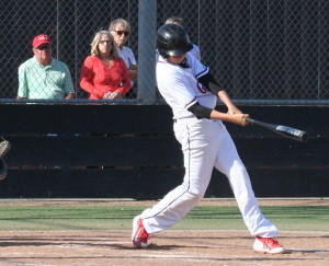 Chad Ferrando rips a single while his biggest fans look on from the stands