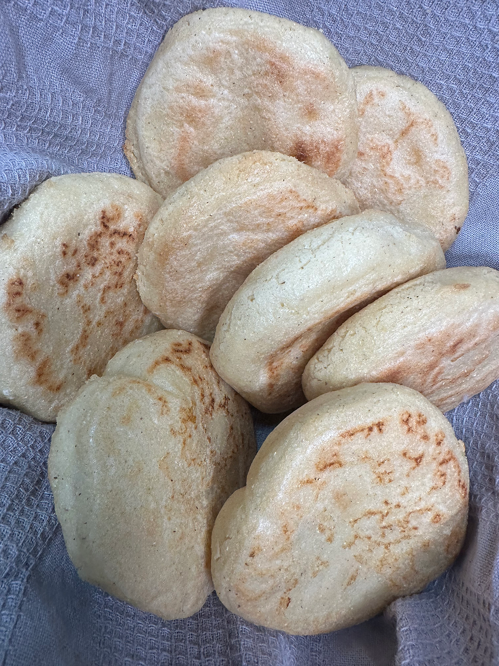 picture of finished vegan arepas in cloth to soften up