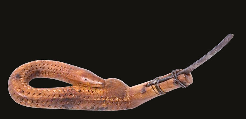 Full view of an unusual Eastern Woodlands snake effigy crooked knife, circa 1880-1900, featuring pine, steel wire, and a repurposed European trade blade. One of only two known examples.