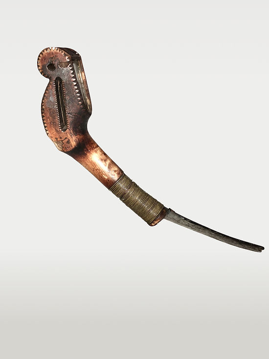 Full right-side view of a mirror inlaid Plains Indians style Santee Dakota crooked knife, circa 1840-1860, featuring wood, wire, and a re-worked European steel trade blade. Ex: Goodman Collection and Jim Hart.
