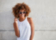 Woman with Curly Hair and Sunglasses