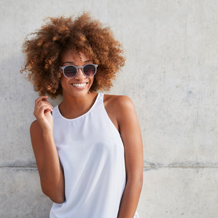 Woman with Curly Hair and Sunglasses