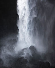 Close-up of a waterfall hitting rocks, captured with soft and flowing motion. From Haifoss on Iceland. 