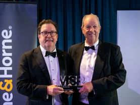 Retail and Commercial Real Estate Legend Colin Henry honoured with Max Raine Award at record Raine & Horne event