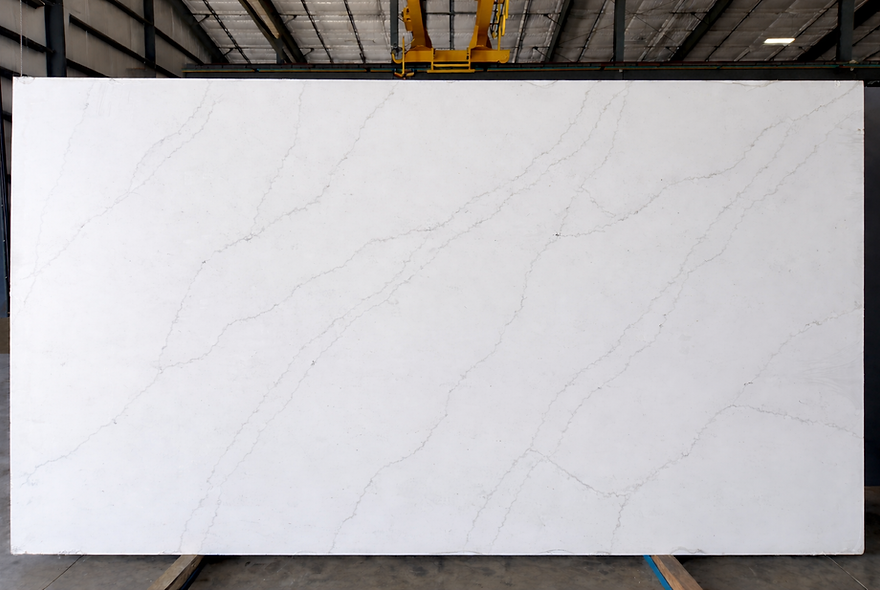 Bianco Venatino quartz slab with soft beige and light taupe veining on warm white background – CounterSource San Antonio