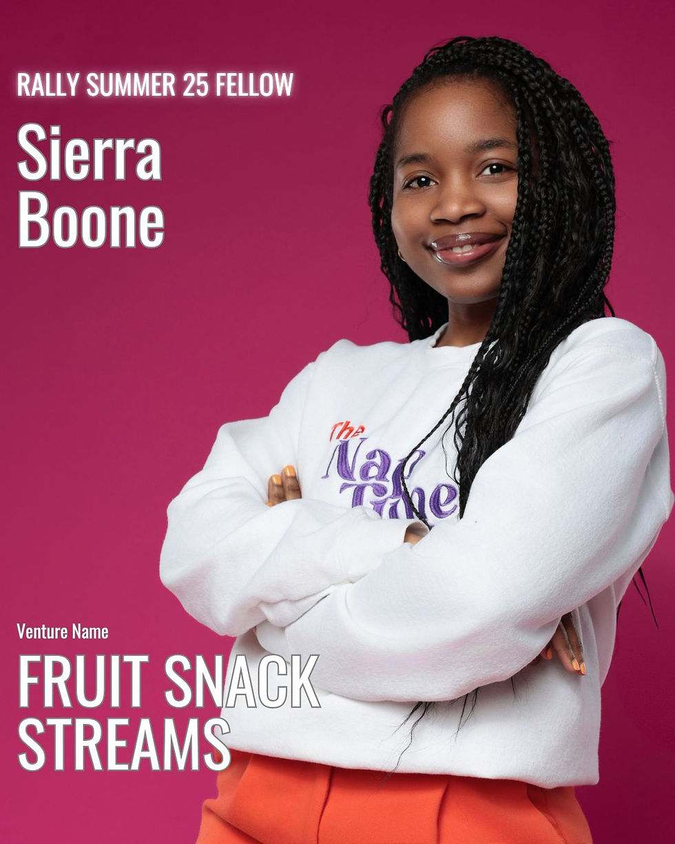 Young person smiling with folded arms, wearing a white sweater on a pink background. Text: "Rally Summer 25 Fellow, Sierra Boone, Fruit Snack Streams."