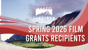 White text in front of the Boulder Flatirons