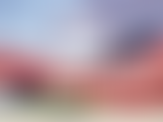 White text in front of the Boulder Flatirons