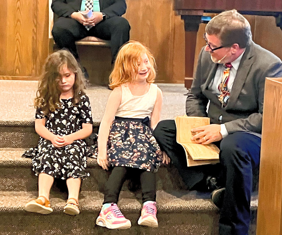 Close-up view of a scripture reading in a worship service