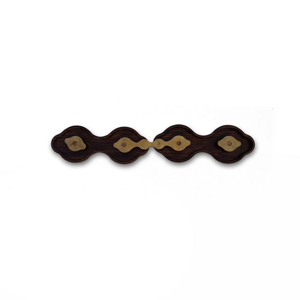 Top view of a linear handcrafted teakwood luxury essentials holder with brass motifs