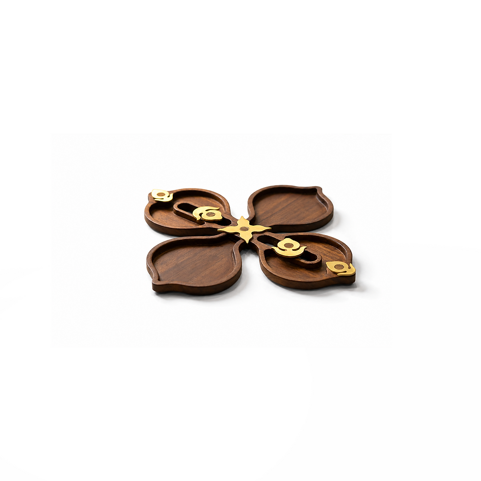 Isometric view of a petal shaped handcrafted multipurpose teakwood tray used as a luxury essentials holder with brass motifs.