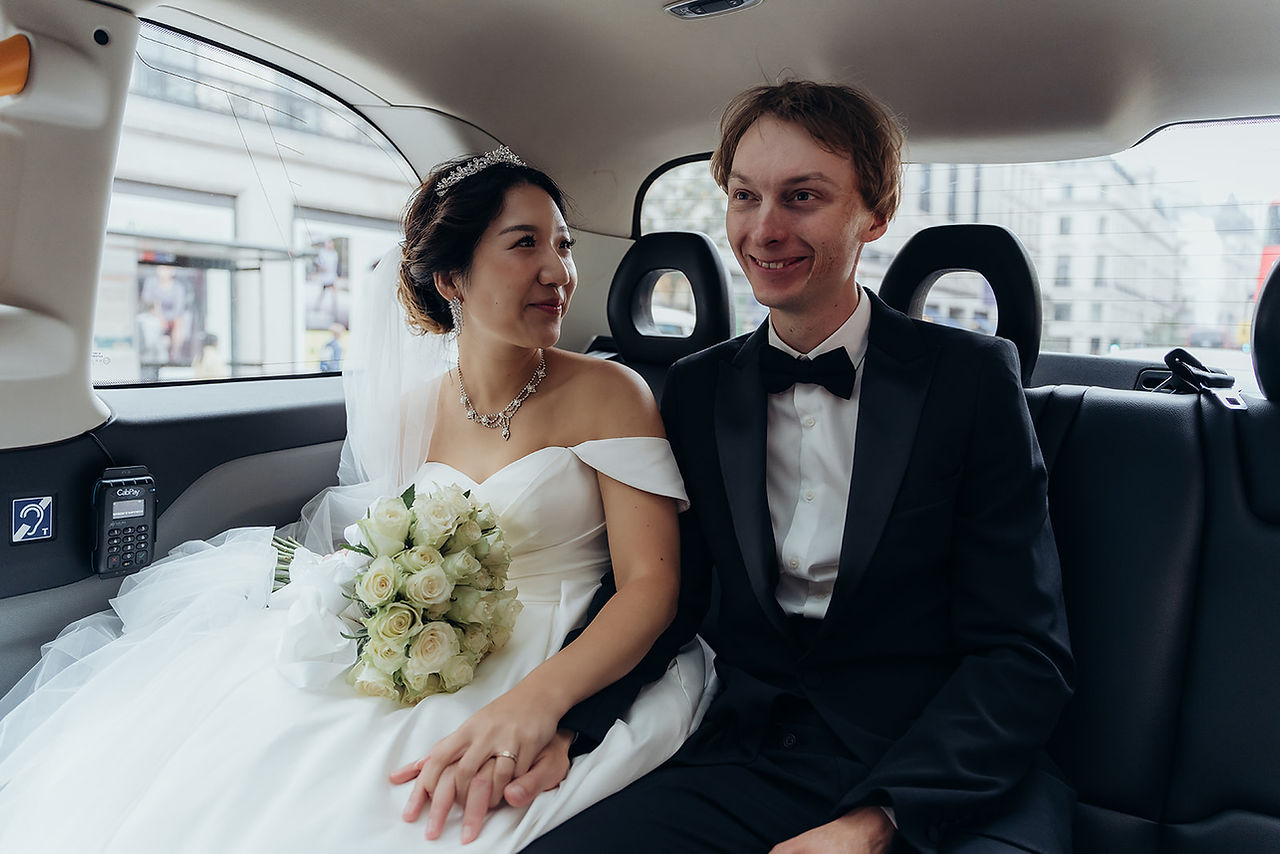 After the ceremony, we embarked on a breathtaking journey through some of London’s most picturesque locations. Our first stop was Park Crescent, where the couple posed gracefully against the backdrop of elegant Regency architecture. The stunning symmetry and classic style of the crescent provided a timeless aesthetic for their wedding portraits.  From there, we moved to Regent Street, capturing candid and romantic moments amid the hustle and bustle of London’s vibrant heart. The grand buildings and festive atmosphere made for striking wedding photography, blending modern energy with timeless romance.  To round off the day, we traveled to Westminster, where Vadim and Yu stood before some of London’s most recognizable landmarks. From Big Ben to the Houses of Parliament, every shot captured the essence of their love story in the city’s most iconic settings. These final moments created breathtaking memories that will last a lifetime.