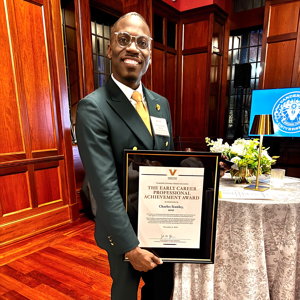 Founder Charles Stanley receiving the Early Career Professional Achievement Award from Vanderbilt University