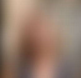 A woman smiling at the camera