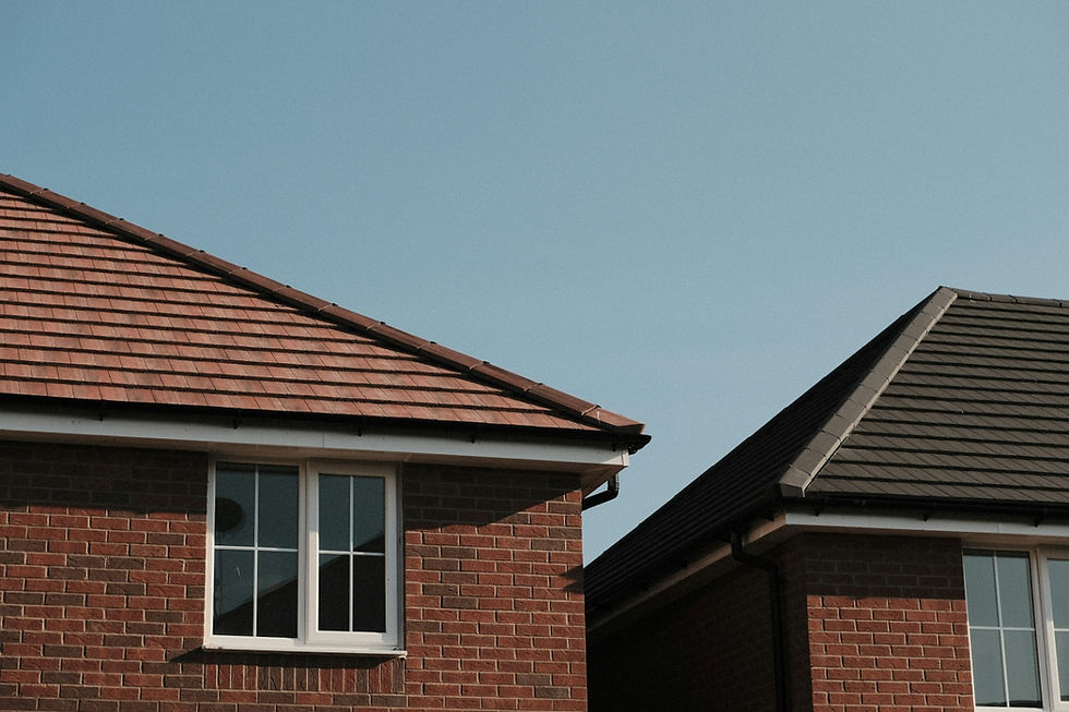 Two houses with red brick