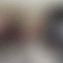 The waiting room at Garry Oak Acupuncture & Herbs : desk, couch and shelves of TCM herbal formulas