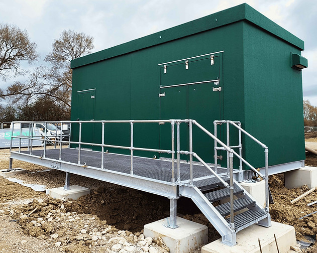 External steel staircase and platform by Hill Grwp Ltd