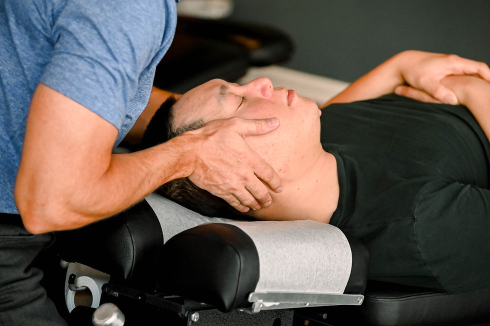 Dr. Matt Hayden performing a light deep tissue massage.