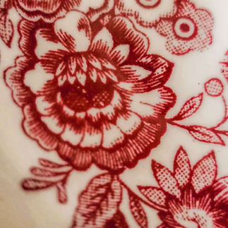 red transferware vintage plates