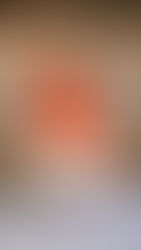 Vintage lace tablecloth skirt. Ali in front of brass candleholders