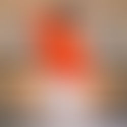 Vintage lace tablecloth skirt. Ali in front of brass candleholders