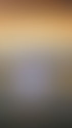 Ali wearing a lace tiered Free People romper in the sunset kissed hour