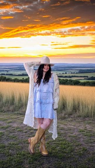Ali in the sunset wearing Free People tiered romper
