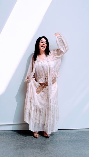 Content creator Ali posing in a western-inspired skirt set, showcasing a "Sunday Style" fashion look for a wellness and style blog.